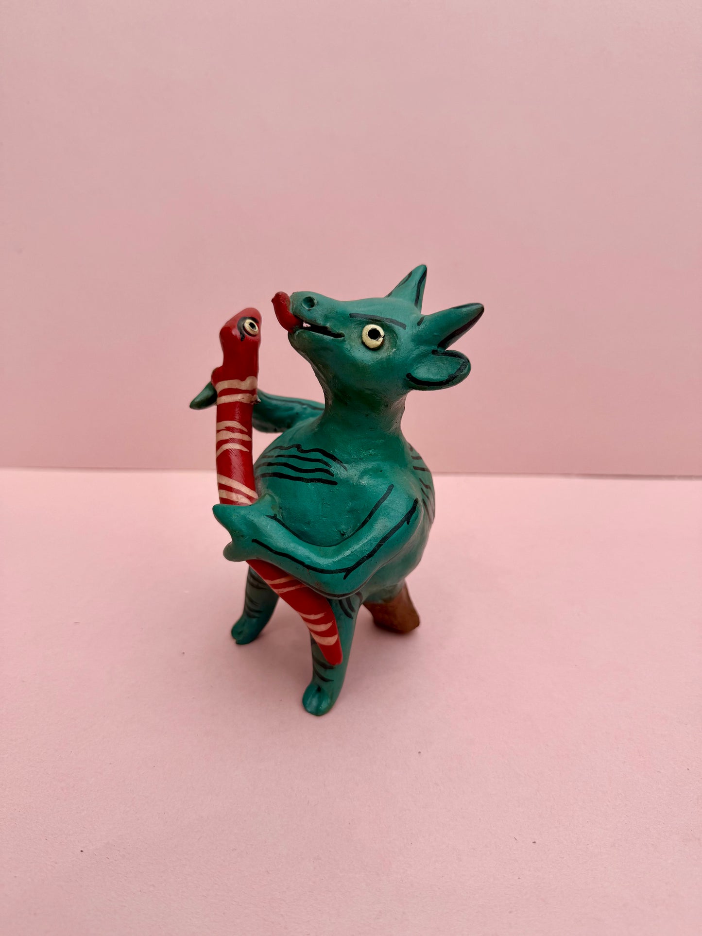 Devil with snake whistle sculpture (#9)